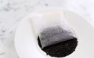 One Earth® Biodegradable Compostable Tea Bag with Loose Black Tea in a Serving Dish