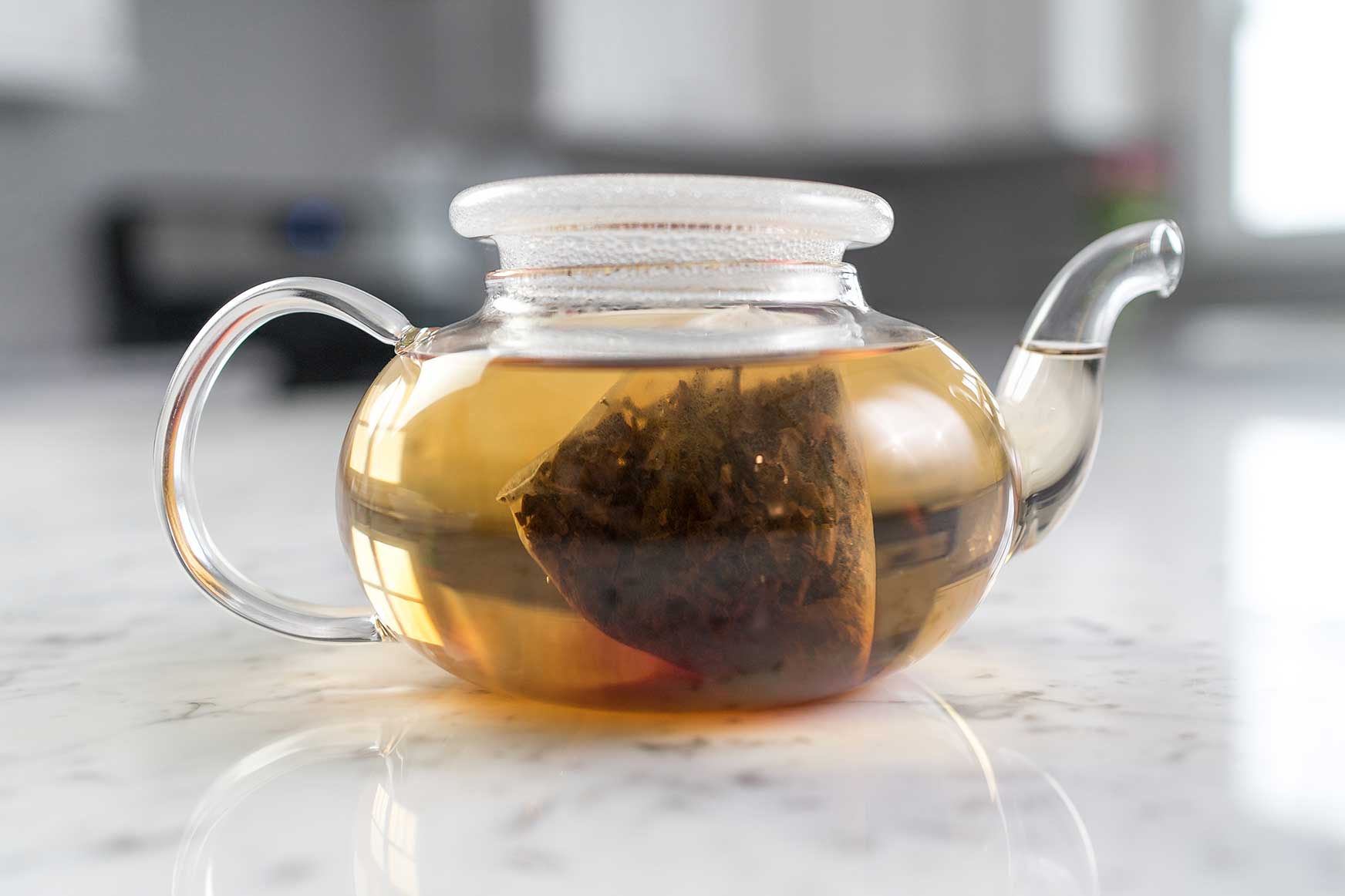 One Earth® biodegradable, compostable tea bag in glass teapot